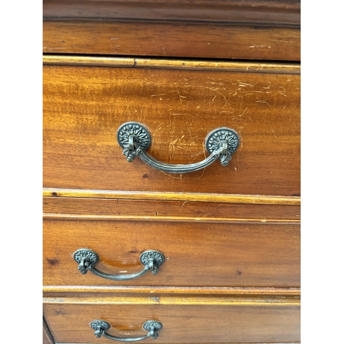 202 - A French Empire style mahogany chest of two short over three long drawers
