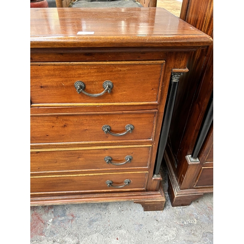 202 - A French Empire style mahogany chest of two short over three long drawers