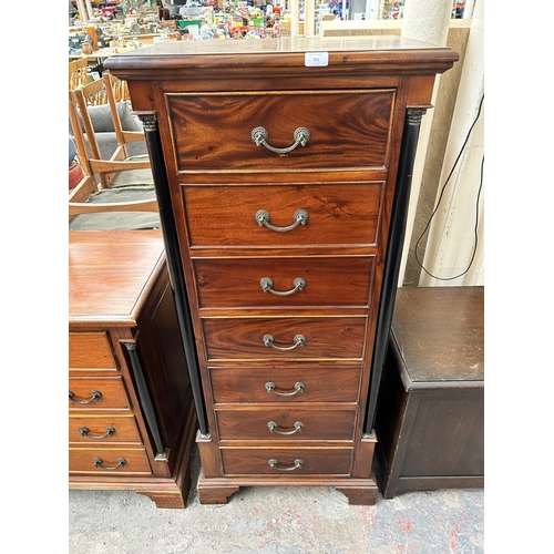 203 - A French Empire style mahogany chest of seven drawers