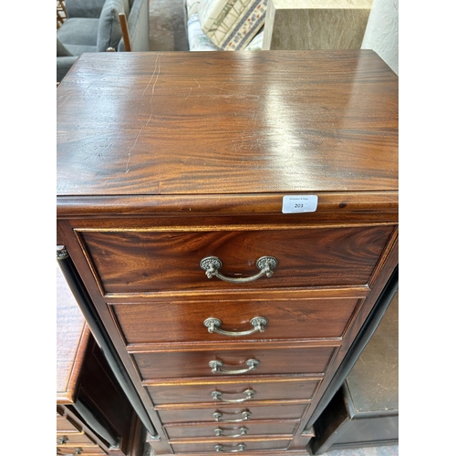 203 - A French Empire style mahogany chest of seven drawers