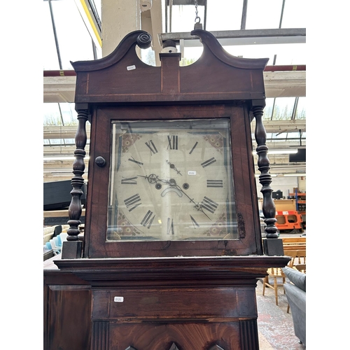 207 - A George III inlaid mahogany cased grandfather clock with pendulum and two weights