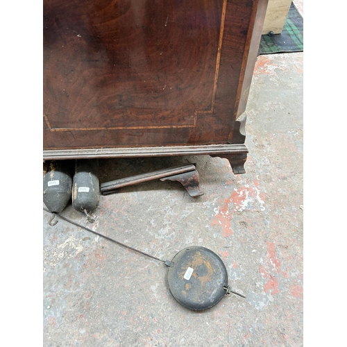 207 - A George III inlaid mahogany cased grandfather clock with pendulum and two weights