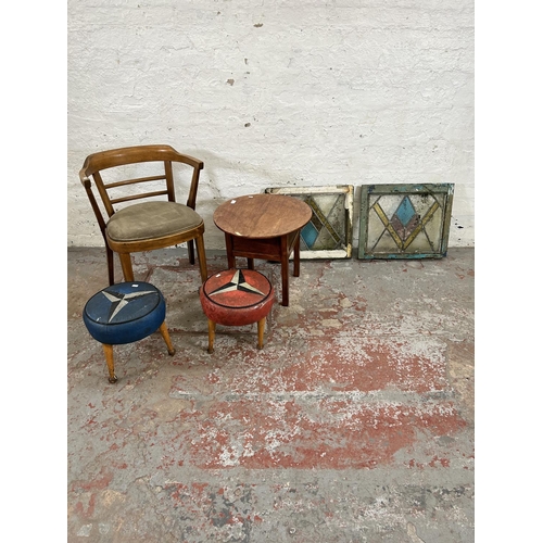210 - Six pieces of furniture, two 1930s stained glass windows, two vinyl upholstered circular footstools ... 