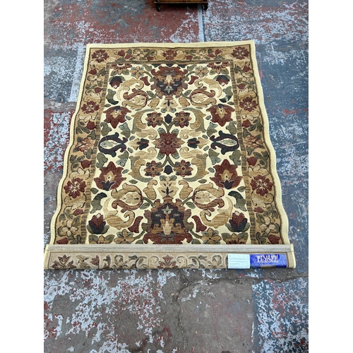 220 - An Elysee floral rug - approx. 170cm x 120cm