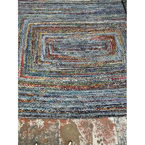 222 - A vintage Boucherouite rag rug - approx. 3.5M long x 2.72M wide