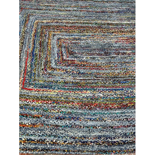 222 - A vintage Boucherouite rag rug - approx. 3.5M long x 2.72M wide