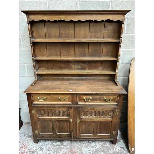 23 - A Georgian style oak Welsh dresser - approx. 191cm high x 137cm wide x 48cm deep