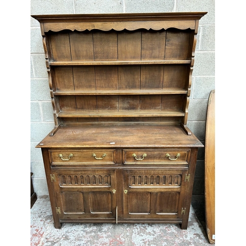 23 - A Georgian style oak Welsh dresser - approx. 191cm high x 137cm wide x 48cm deep