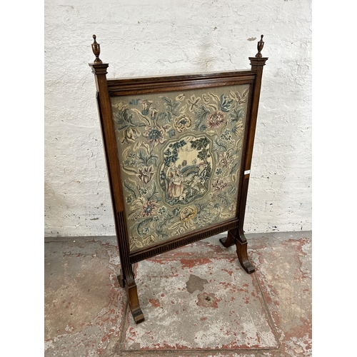 26 - A late 19th century oak framed tapestry fire screen - approx. 127cm high x 75cm wide