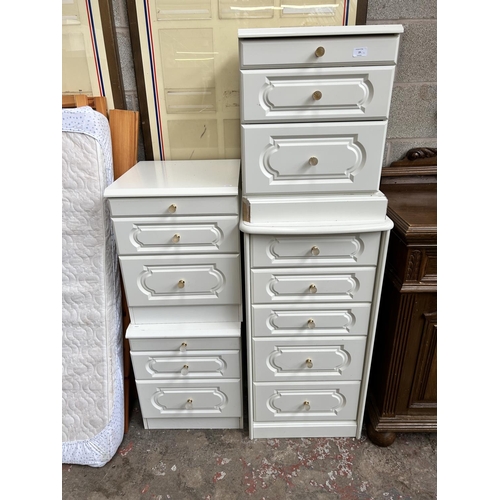 29 - Four late 20th century white laminate chests of drawers, three bedside chests of three drawers and o... 