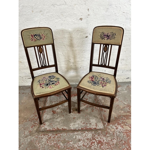 32 - A pair of Edwardian inlaid mahogany and tapestry upholstered occasional chairs