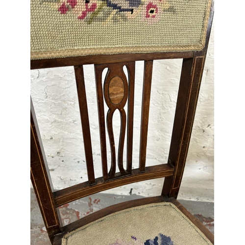 32 - A pair of Edwardian inlaid mahogany and tapestry upholstered occasional chairs