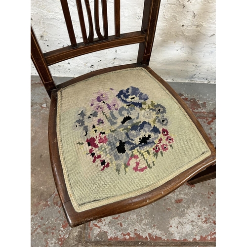 32 - A pair of Edwardian inlaid mahogany and tapestry upholstered occasional chairs