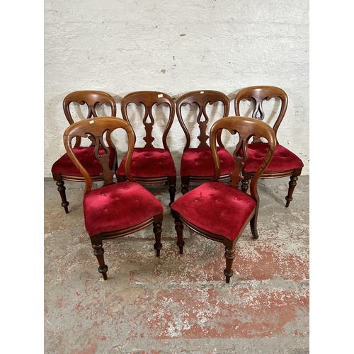 33 - A set of six Victorian mahogany balloon back dining chairs