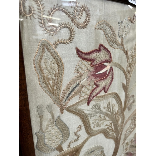 36 - An early 20th century mahogany framed and silk embroidered fire screen