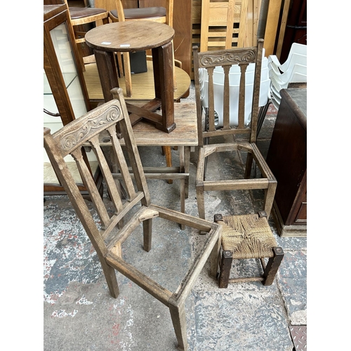 41 - Five pieces of furniture, two Edwardian carved oak dining chairs, one mid 20th century pine and rush... 