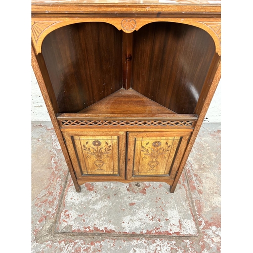 50 - An Edwardian carved mahogany free standing corner cabinet with two upper bevelled edge mirrors, two ... 