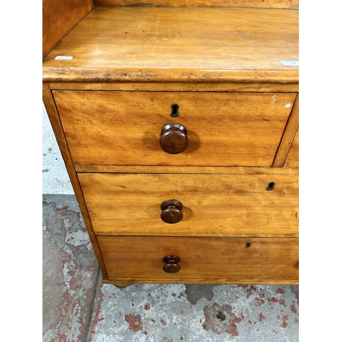 73 - A Victorian satin birch chest of two short over two long drawers with galleried back