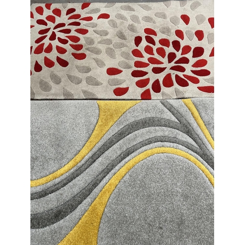 75 - Two Dunelm rugs, one Mirage Ochre - approx. 150cm x 80cm and one Floral Spray Natural Red - approx. ... 