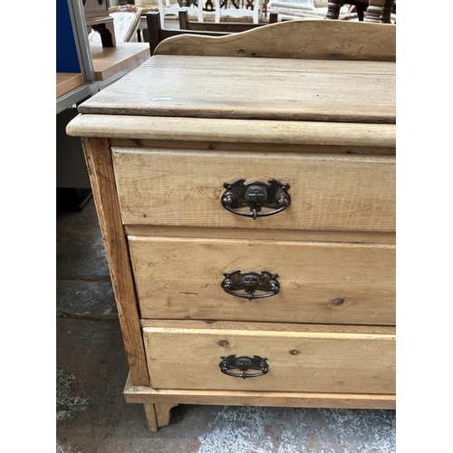 85 - A late Victorian pine chest of three drawers