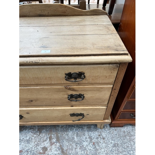 85 - A late Victorian pine chest of three drawers