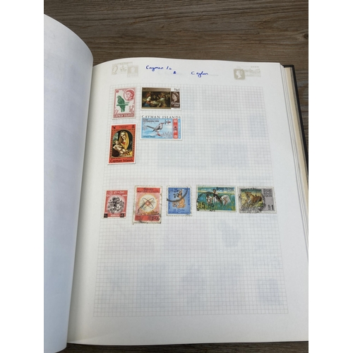 1411A - Three albums containing a collection of stamps and first day covers