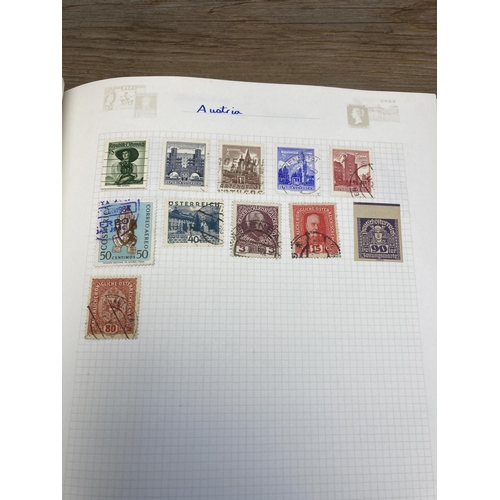 1411A - Three albums containing a collection of stamps and first day covers