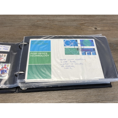 1411B - Three albums containing a collection of first day covers