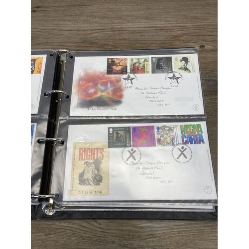 1411B - Three albums containing a collection of first day covers