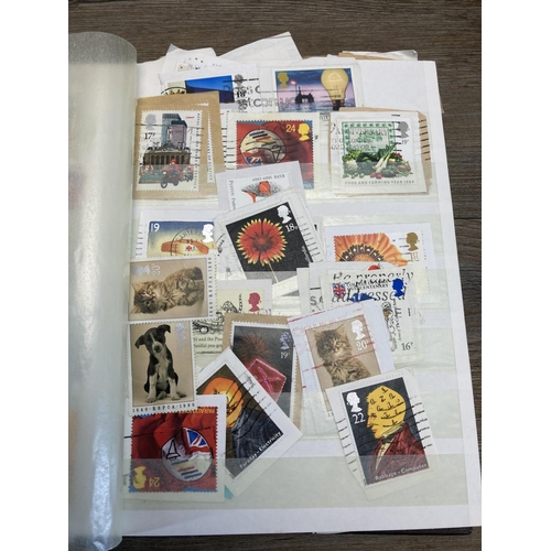 1414 - Seven albums containing a collection of worldwide stamps