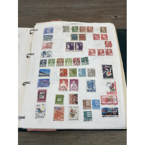 1414 - Seven albums containing a collection of worldwide stamps