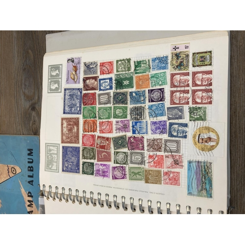 1416 - Five albums containing a collection of worldwide stamps