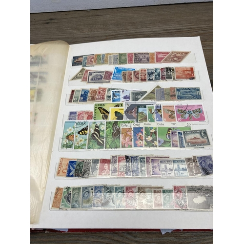 1417 - Nine albums containing a collection of worldwide stamps