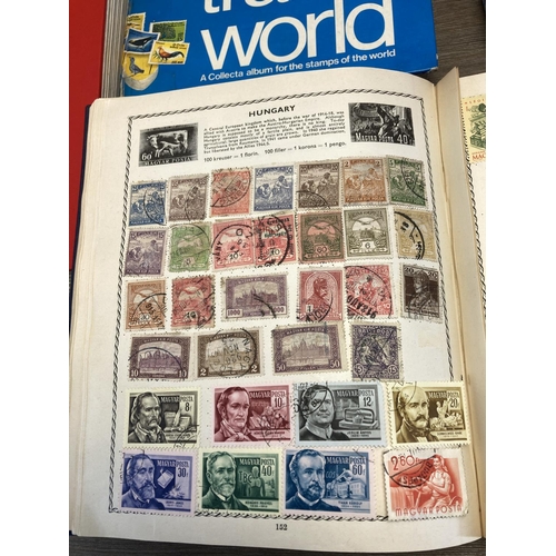 1417 - Nine albums containing a collection of worldwide stamps