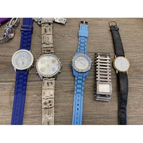 1420 - A collection of women's and men's quartz wristwatches to include Lipsy of London etc.