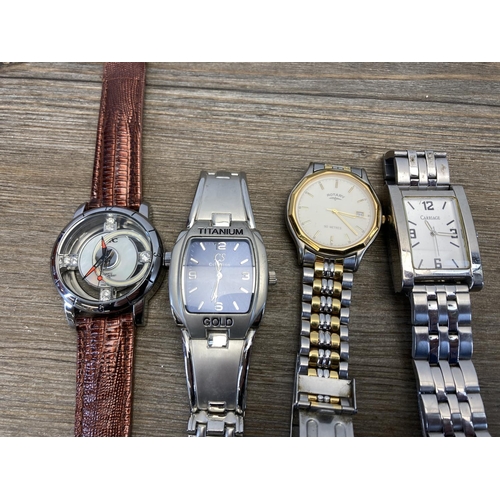 1422 - A collection of men's quartz wristwatches to include Rotary, Pulsar, Carriage etc.