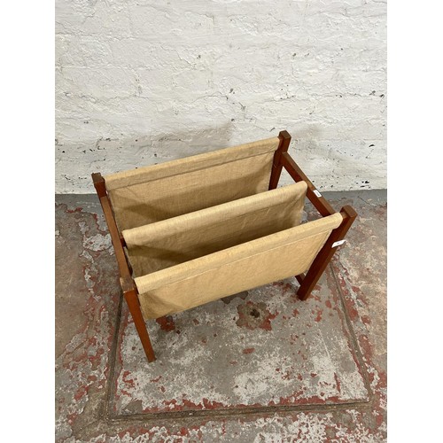 88 - A mid 20th century Danish teak and canvas two section magazine rack