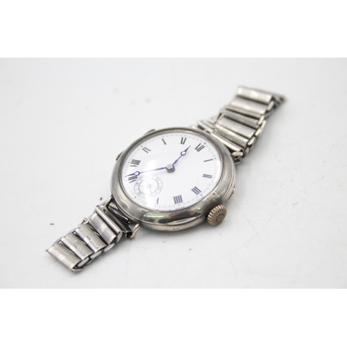 2502 - A hallmarked .925 silver trench style mechanical men's wristwatch