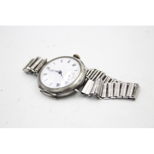 2502 - A hallmarked .925 silver trench style mechanical men's wristwatch