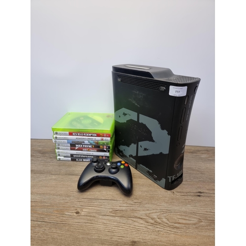 A Microsoft Xbox 360 Elite COD MW2 limited edition console with games