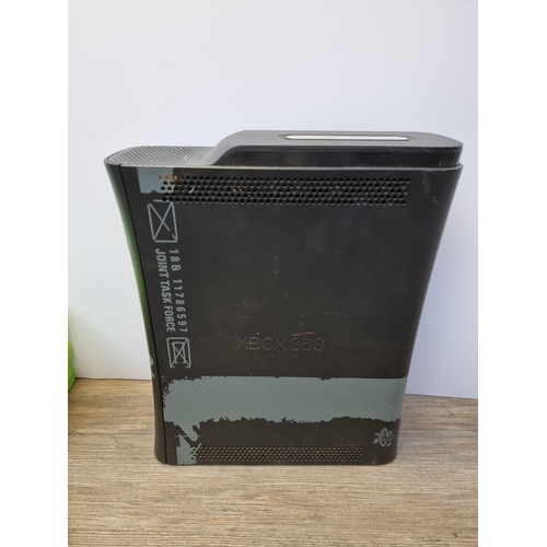 A Microsoft Xbox 360 Elite COD MW2 limited edition console with games