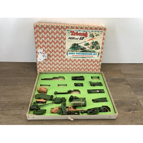 1700 - A vintage boxed Tri-ang Push & Go Army presentation set