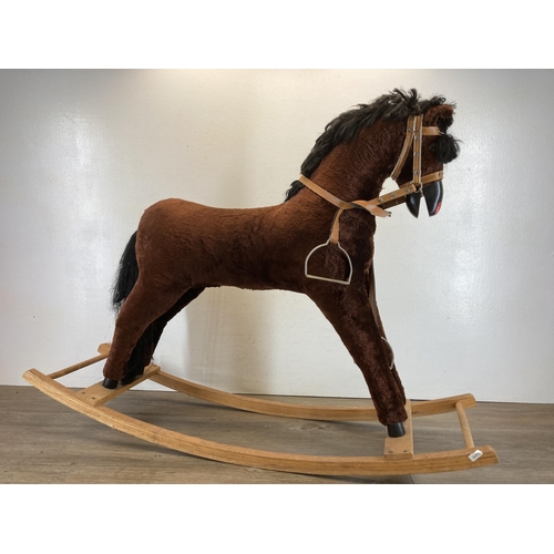 1705 - A modern brown fabric rocking horse on wooden stand - approx. 79cm high