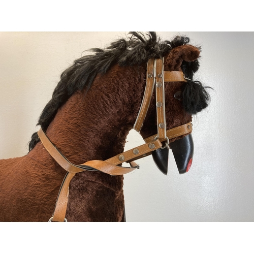 1705 - A modern brown fabric rocking horse on wooden stand - approx. 79cm high