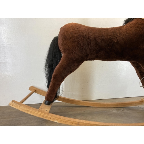 1705 - A modern brown fabric rocking horse on wooden stand - approx. 79cm high