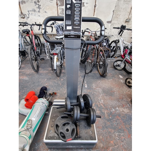 286 - An Exercise Express vibration workout machine together with a pair of dumbbells and various weights