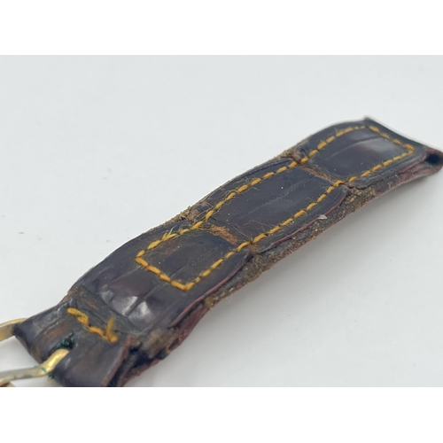 2472 - A mid 20th century Rolex crocodile skin 14mm strap and 18ct gold plated 16mm buckle