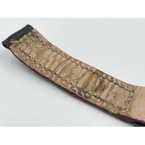 2472 - A mid 20th century Rolex crocodile skin 14mm strap and 18ct gold plated 16mm buckle