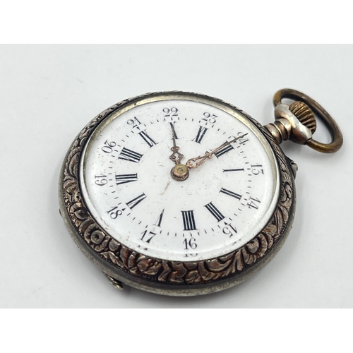 2477 - A late 19th/early 20th century Femina .800 silver open face hand wind pocket watch