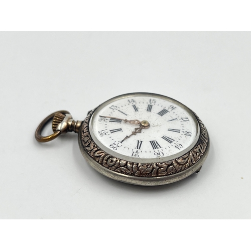 2477 - A late 19th/early 20th century Femina .800 silver open face hand wind pocket watch